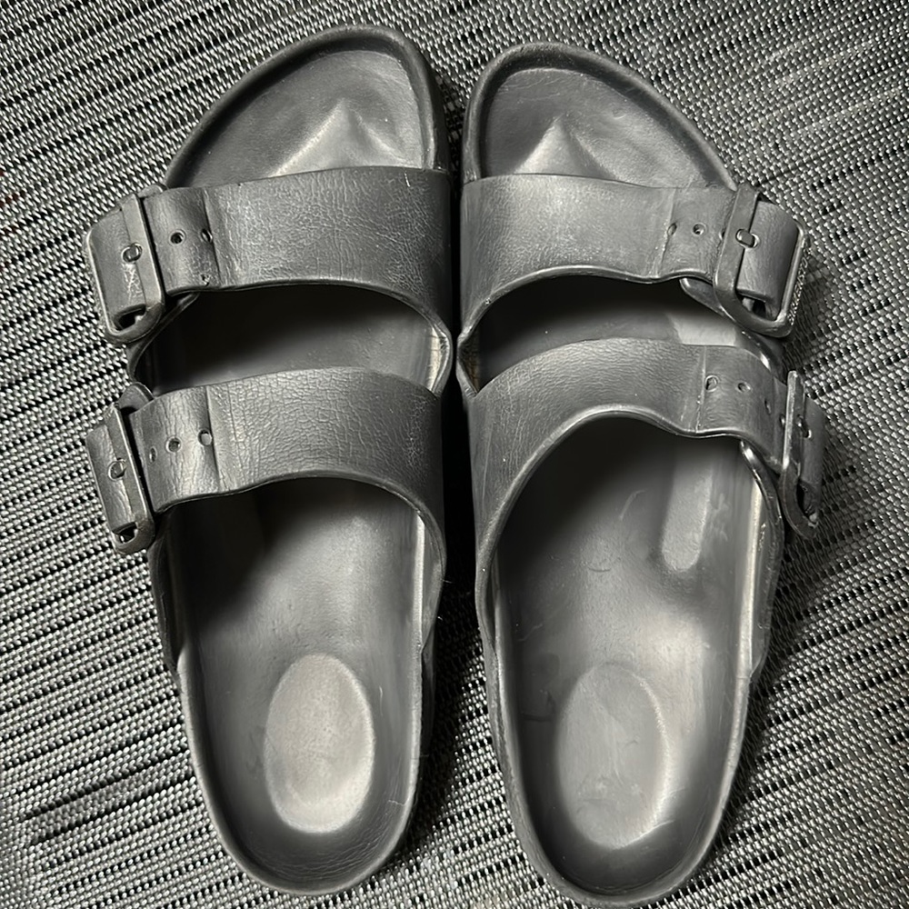 Black plastic Birkenstocks, size 38 / W size 7.
